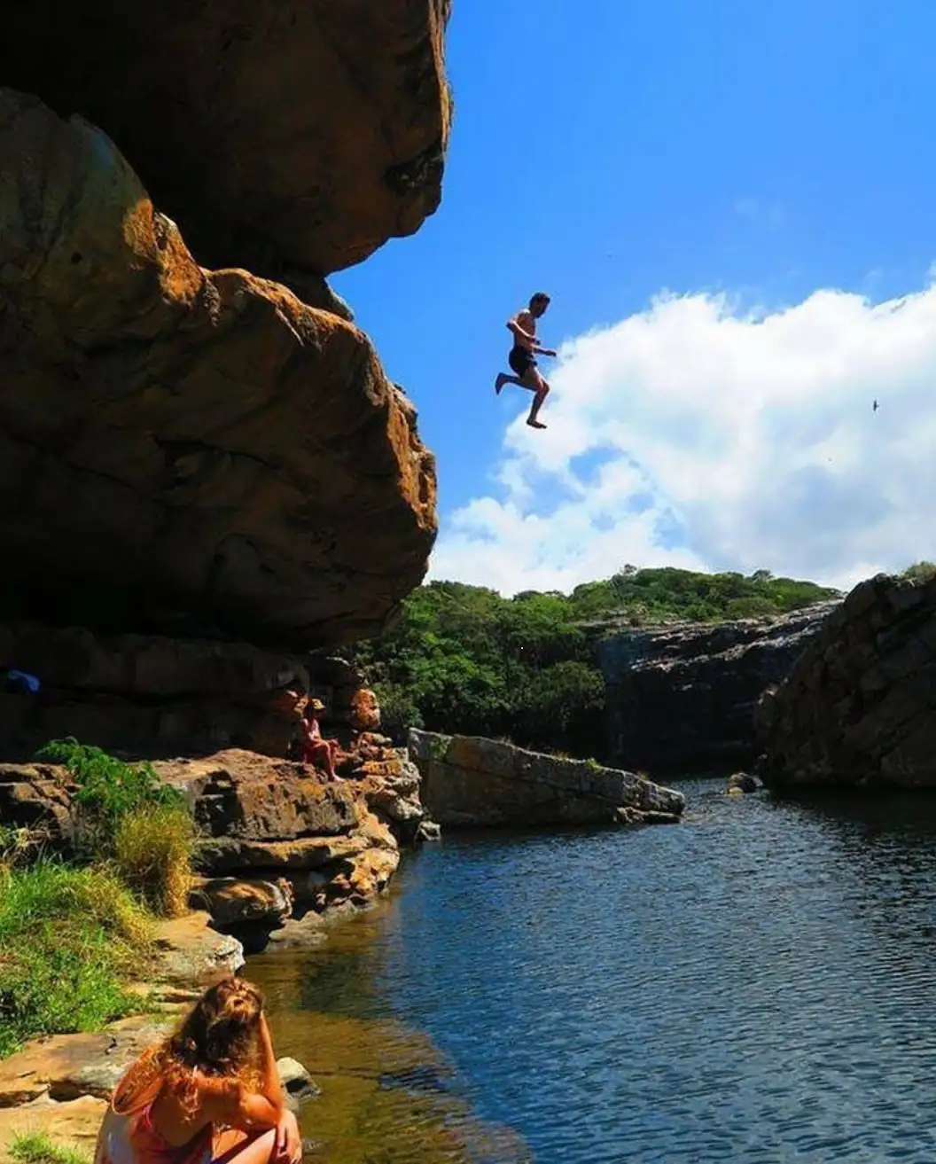 Jumping from Baboon Cave into the pool below