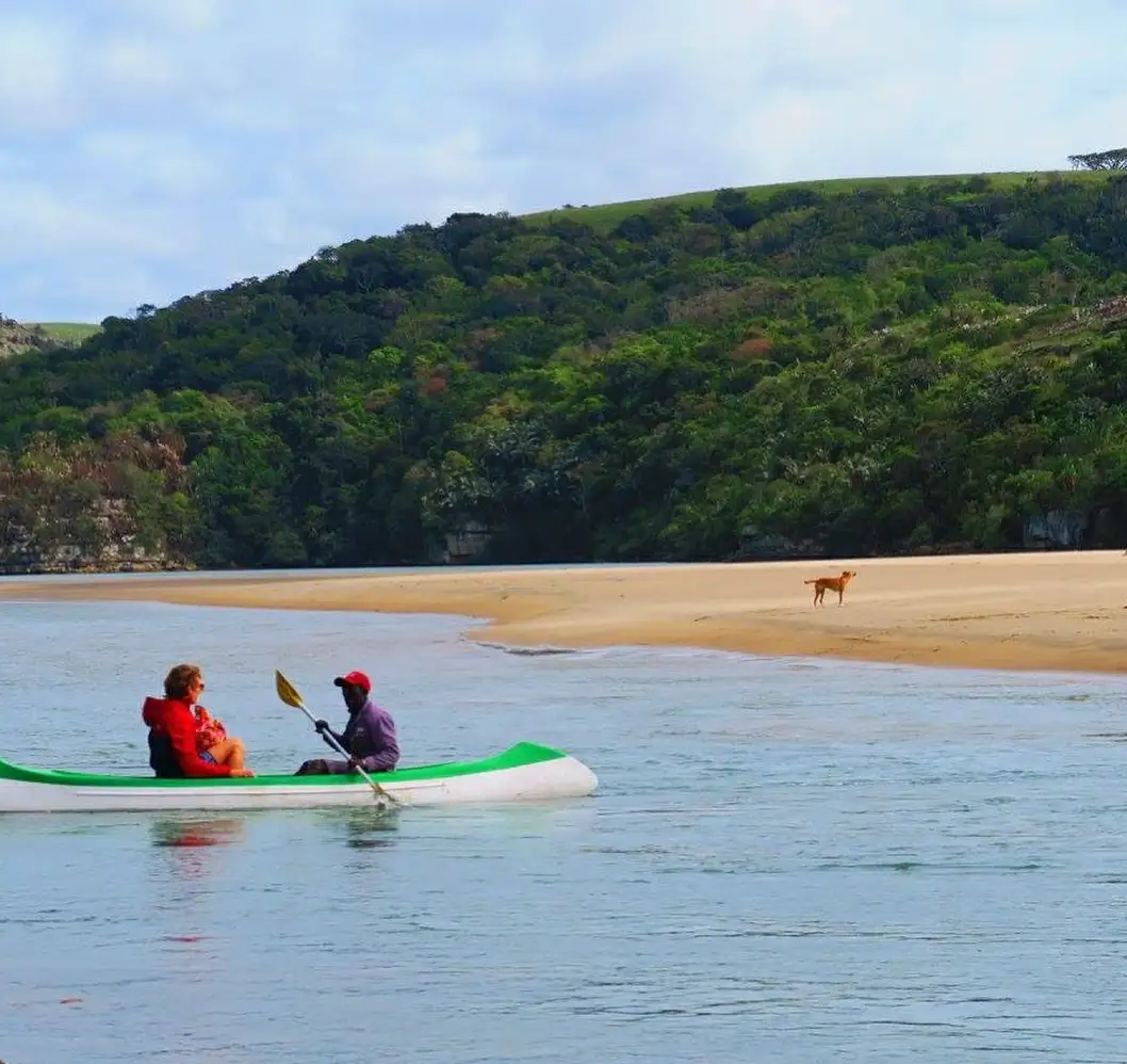 The Mtentu River winds its way through the Wild Coast, carving deep gorges and feeding lush valleys before spilling into the Indian Ocean. From the water, you notice details you'd miss on land.