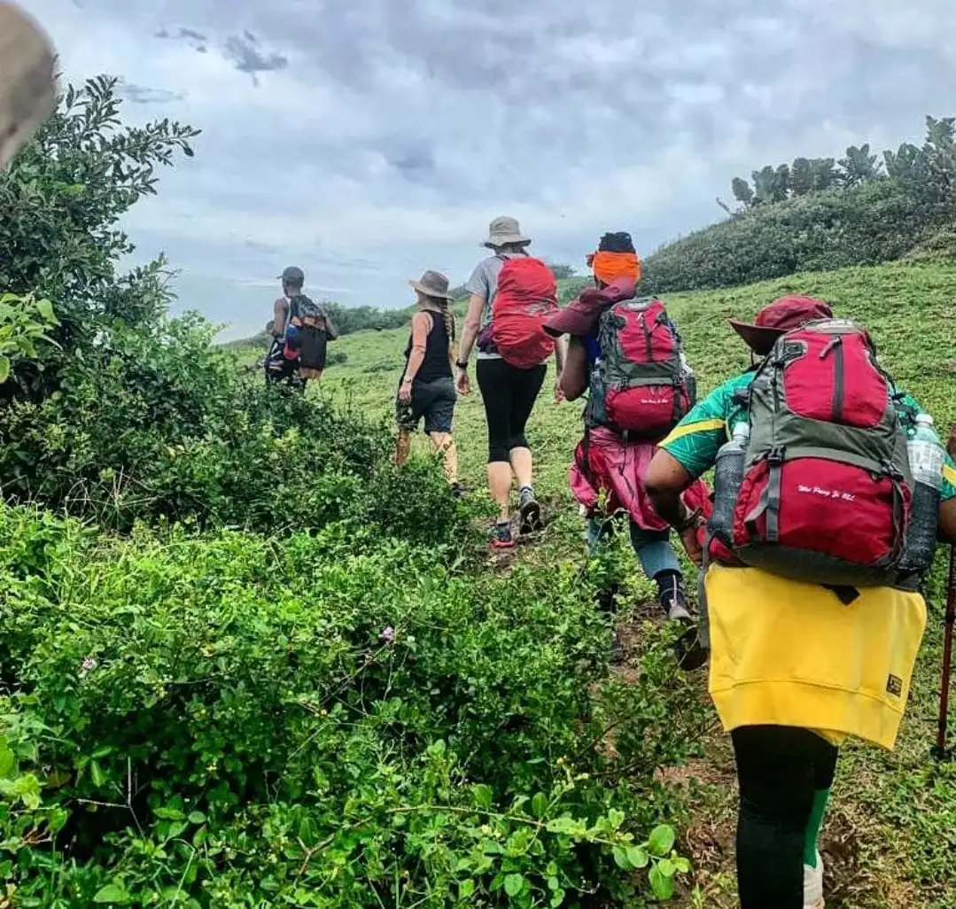 Hikers trekking up from Sikombe beach